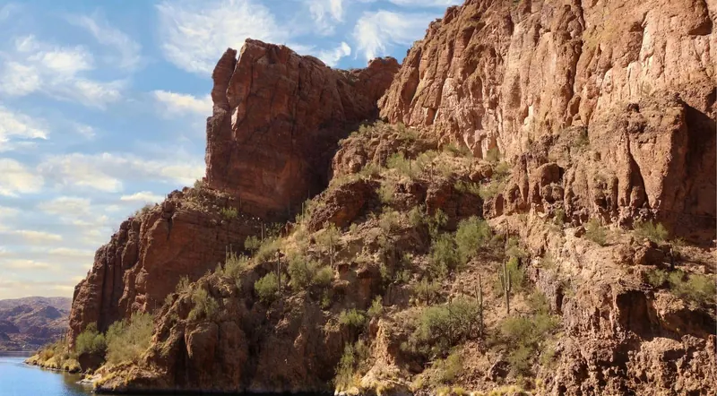Towering canyon walls rising above Canyon Lake
